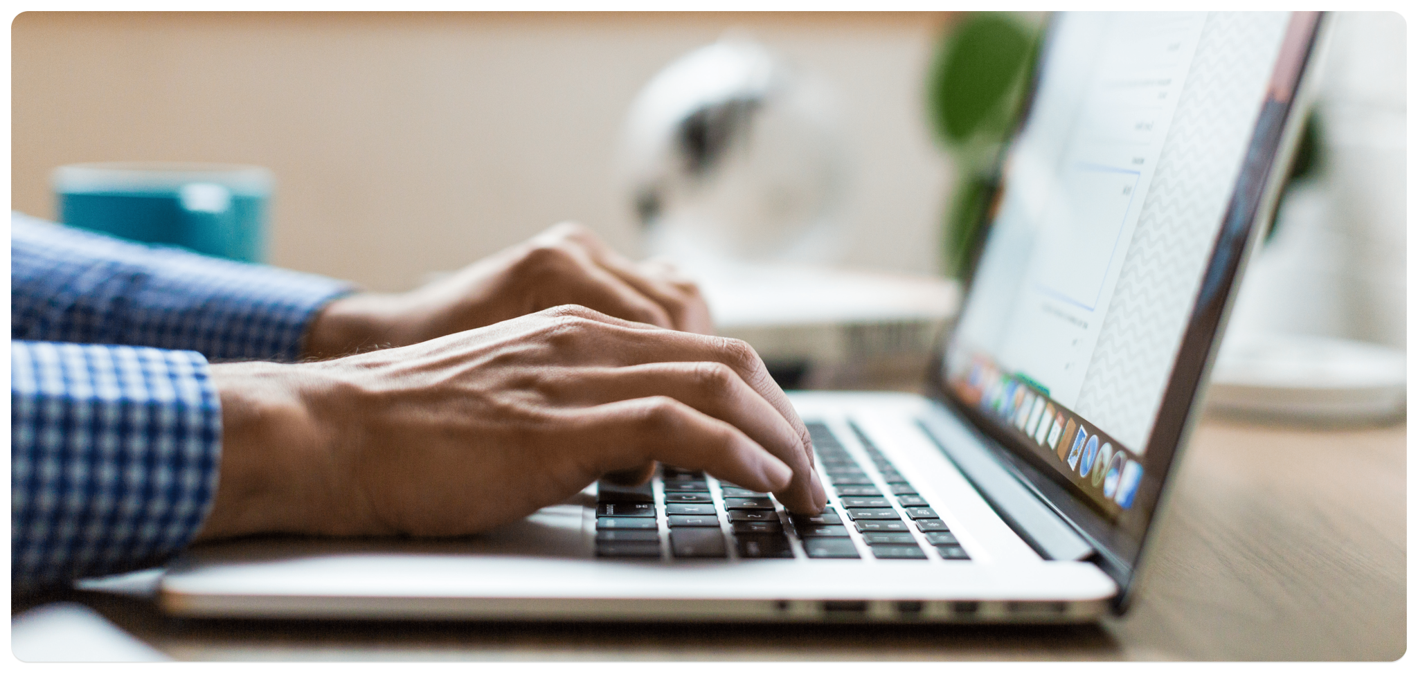Person typing an event sponsorship proposal letter on a screen