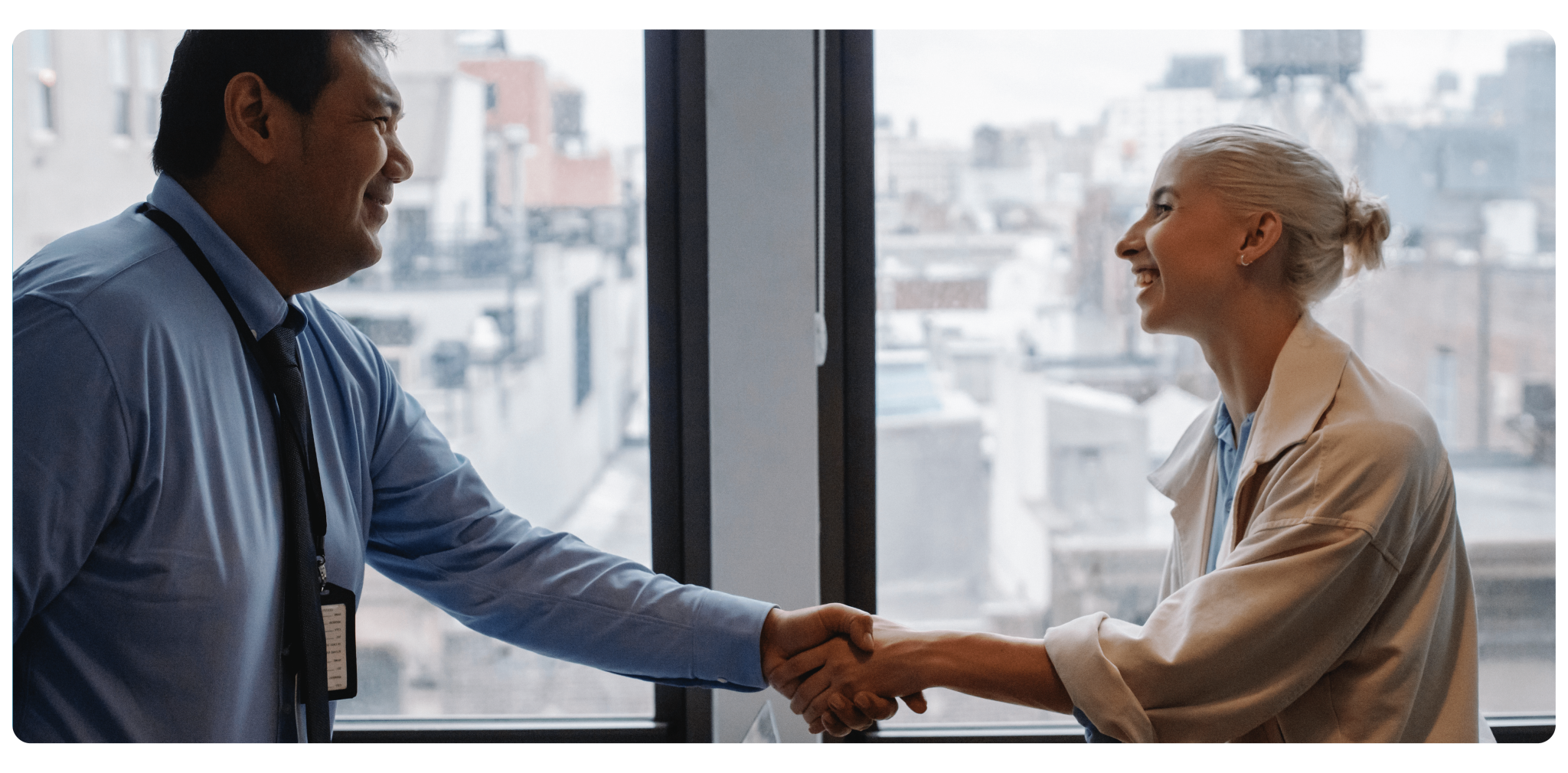 Two people shaking hands to agree an event sponsorship