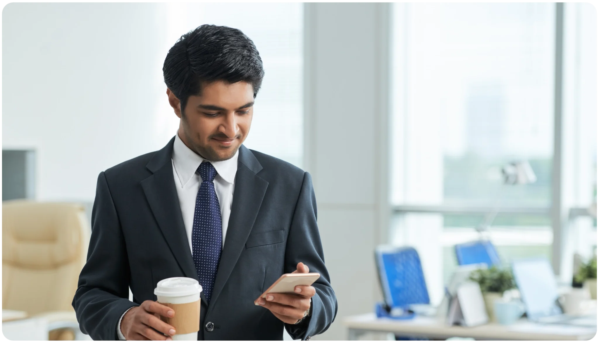 Attendees exchanging contact details to follow up after an in-person event